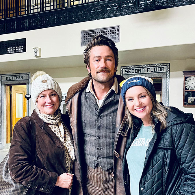 BNSF Director of External Communications Kendall Sloan, right, with her mother, Stacey Kirkham, and Brandon Sklenar, who plays Spencer Dutton in “1923”&nbsp;