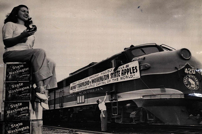 Appleland Princess Lois Banghart helps celebrate GN&rsquo;s 10,000th trainload of apples out of the Wenatchee area in 1947.