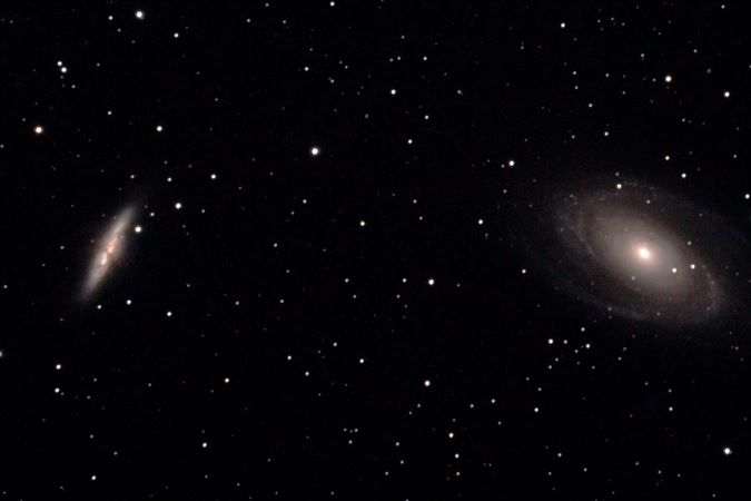 Fortner&rsquo;s image of the M81 (right) and M82 (left), a pair of local galaxies that are falling toward each other just like the Andromeda Galaxy and our own galaxy, the Milky Way. They are about 150,000 light years apart.