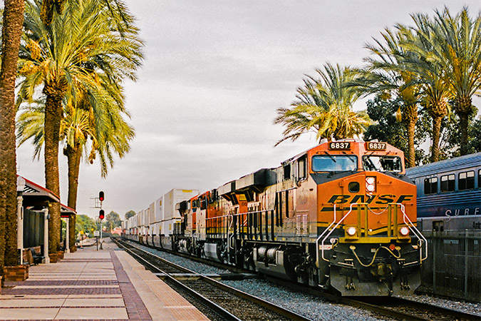 A train loaded with consumer goods heads out in California. A train loaded with consumer goods heads out in California.