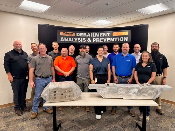 The BNSF team that contributed to ODIN&rsquo;s in-house design. The model on the left is the final version.   